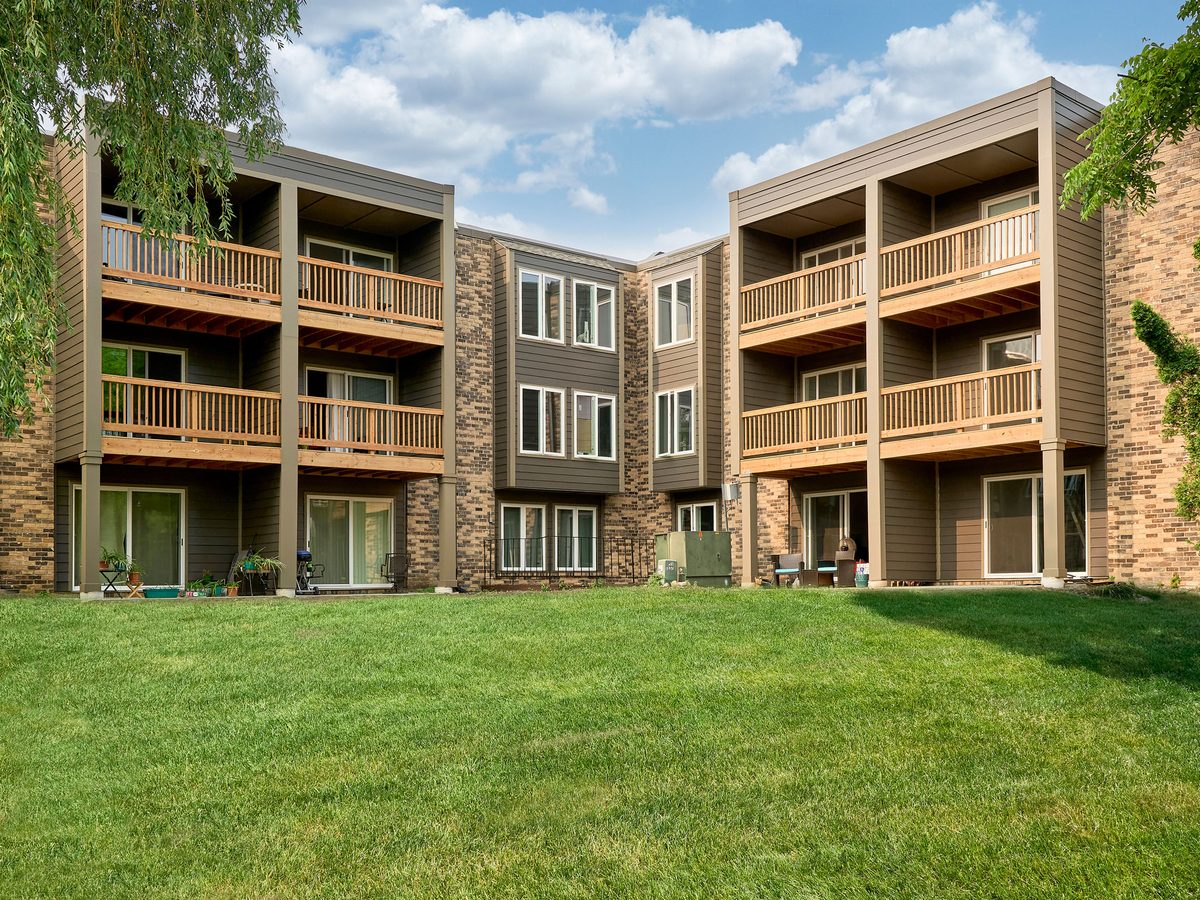 Bridgewalk after the envelope restoration: new siding, rebuilt wood balconies and railings